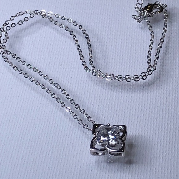 Silver over Stainless Steel Moissanite Ring and Necklace
9 ring 16 necklace - Picture 2 of 3